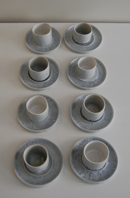 Eight porcelain cups and saucers 